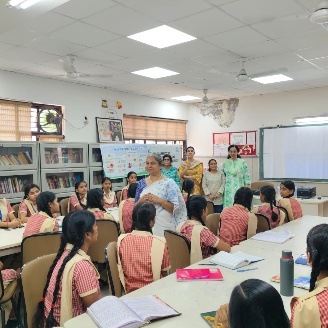Volunteers explaining safe disposal